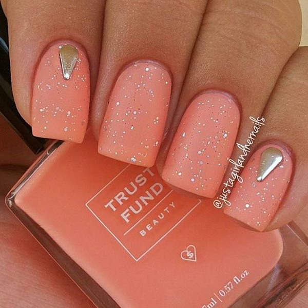 Peachy Matte Nails with Sequins and Silver Studs. 