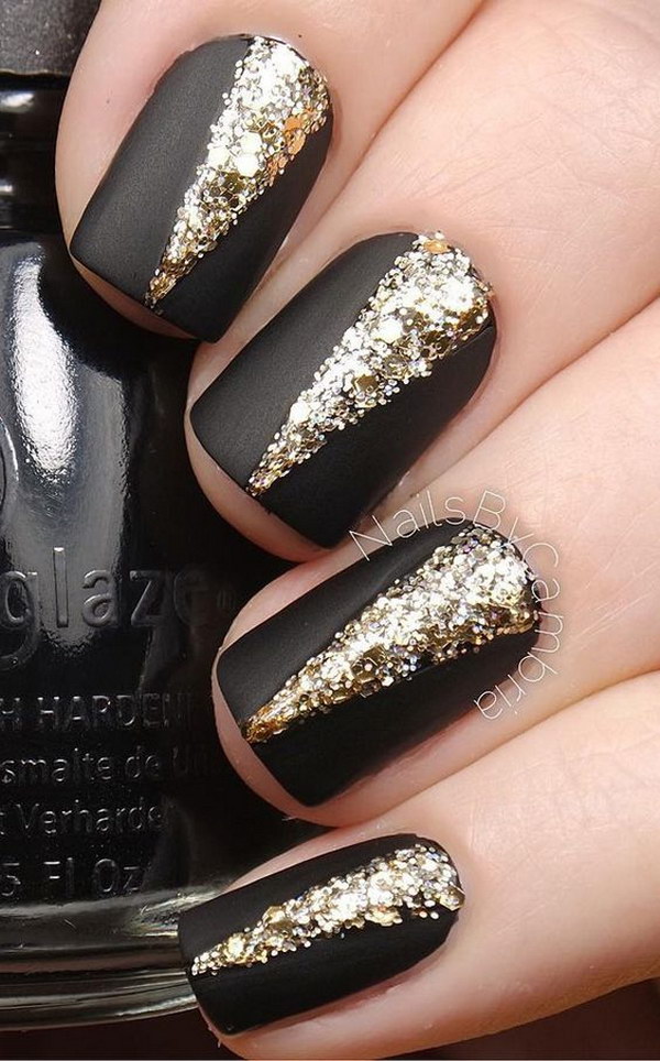 Black Matte Nail Polish with Gold Embellishments on Top. 