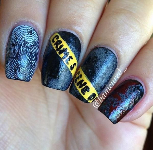 Caution Tape Crime Scene Nails. Cool Halloween Nail Art which show off your spooky spirit during the freakish festivities. 