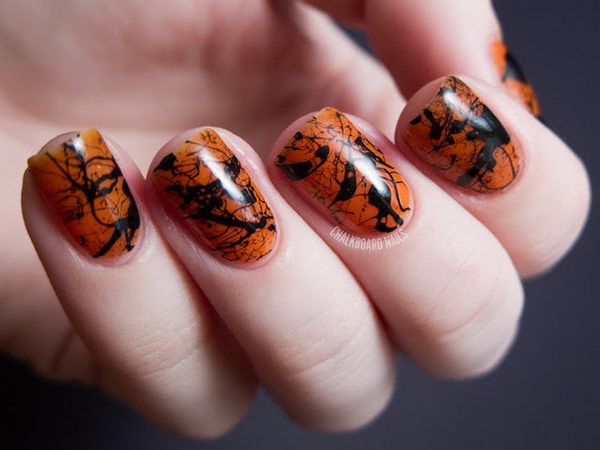 Spooky Splatter Nails. Cool Halloween Nail Art which show off your spooky spirit during the freakish festivities. 