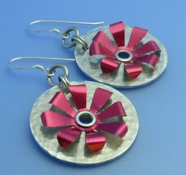 Recycled soda can earrings. After drinking soda from aluminum cans, you can recycle your soda cans to create interesting projects instead of tossing the empty cans into the garbage or recycling bin. 