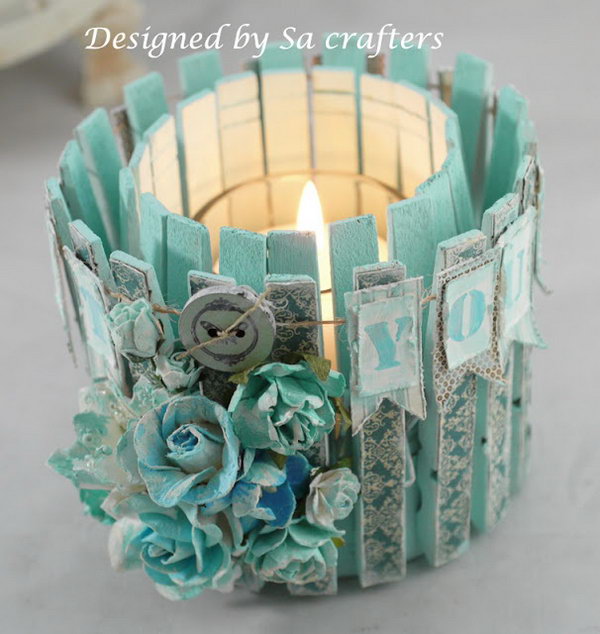 Altered tin can with clothes pins. Tin cans are not just for stacking up in your cabinet, tossing in the trash or sending to the recycle bin. Combine those with a rope, paints, craft papers and a generous helping of crazy imagination, and you will have a cool creation on your hands. 