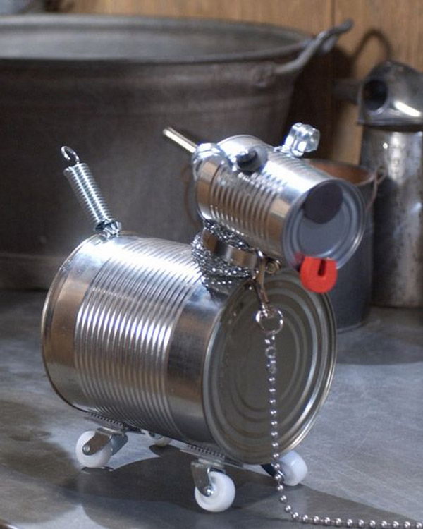 Tin can dog robot. Tin cans are not just for stacking up in your cabinet, tossing in the trash or sending to the recycle bin. Combine those with a rope, paints, craft papers and a generous helping of crazy imagination, and you will have a cool creation on your hands. 