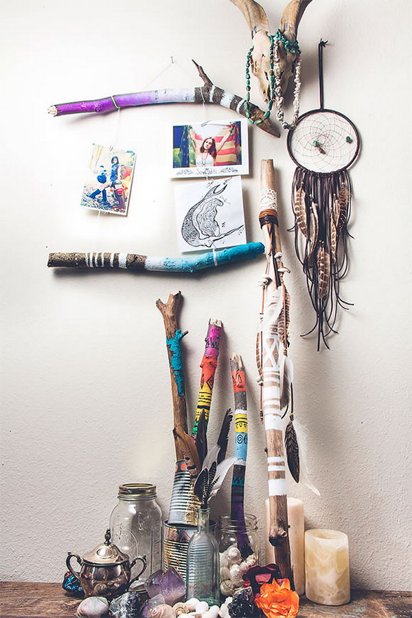Make a little frame using painted tree branches. Knot the string and use paper clips(or clothes pins) to attach the photographs, then hang it on your wall. You can do so many things with these painted beauties. 