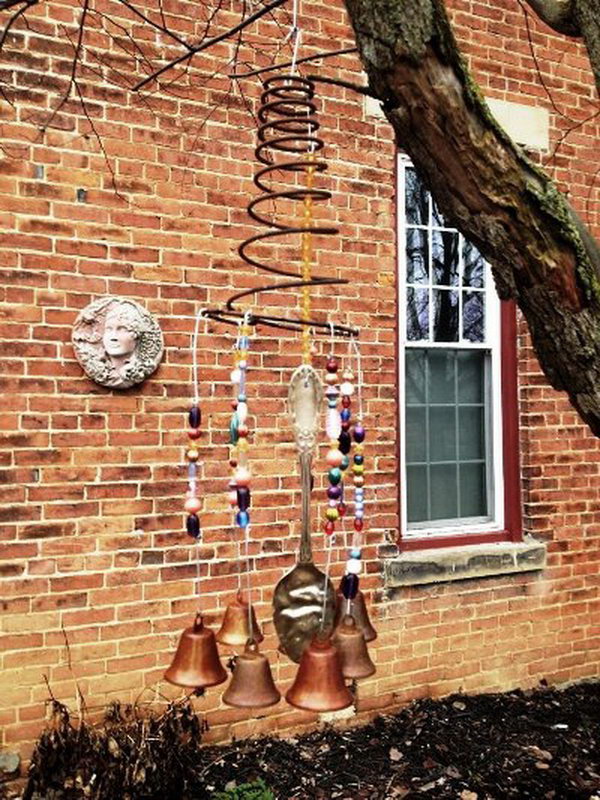 The wind chimes are made from vintage bed springs which create a charming spiral form to start your project. 