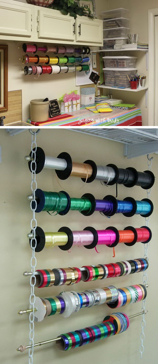 Make a wrapping ribbon organizer with chains, cafe style curtain rods and hooks. It looks great and is so functional. 