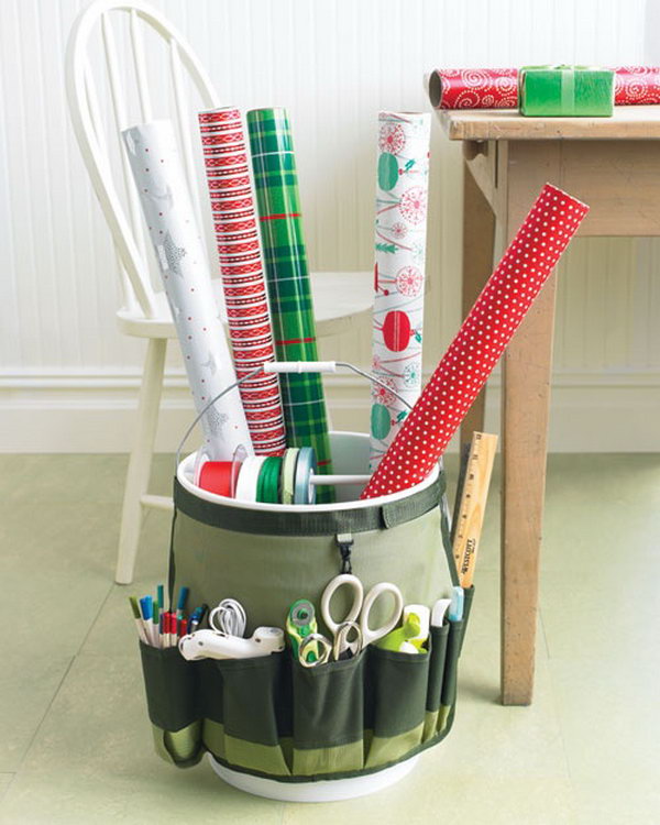 Make a portable gift wrapping station using a pail and a garden bucket caddy. 
