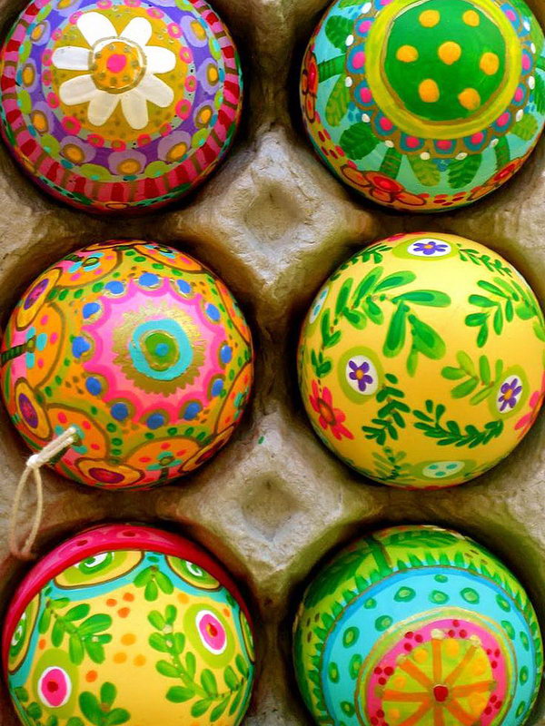 Paint Easter Eggs from bottom to top with spring patterns. 