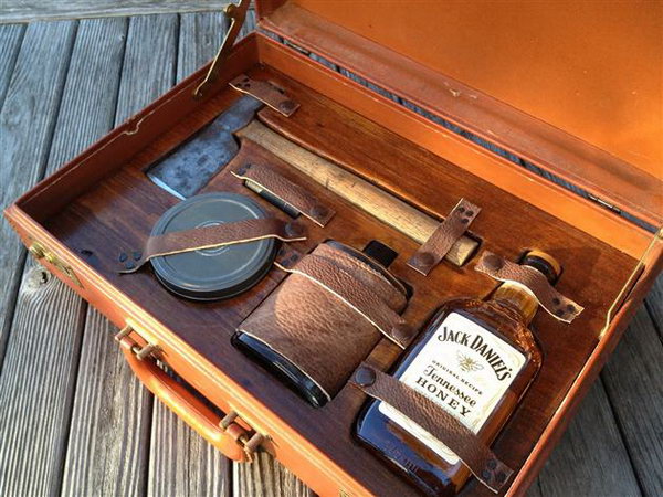 Groomsmen Survival Kit. As gentleman, there are a few items we need to keep ourselves alive. This kit features everything you would need in an emergency including a flask, whiskey, hatchet, matches, and a handful of other goods packed into a vintage briefcase. 