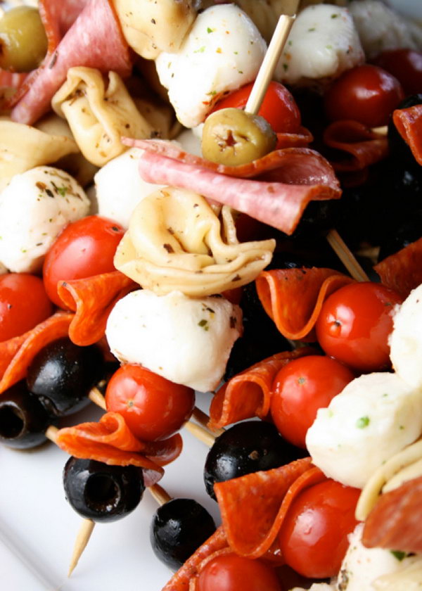 Antipasto Kebobs. After cooking tortellini, place it in a bowl or freeze gallon bag. Top it with salad dressing and marinade in the fridge in a few hours to prepare this delicious birthday party food for your guests. 