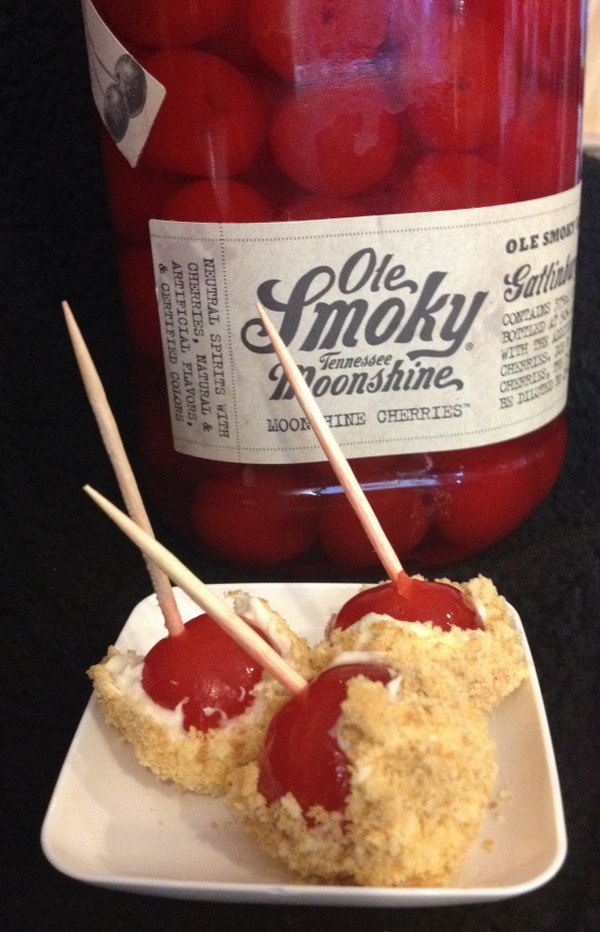 Moonshine Cherry Cheesecake Bombs. Mix whipped cream cheese, sugar and extract vanilla for creamy ingredients. Dip the graham crumbs with covered cherry and cream cheese coating. This sweet style matches with the sweet cocktail party theme perfectly. 