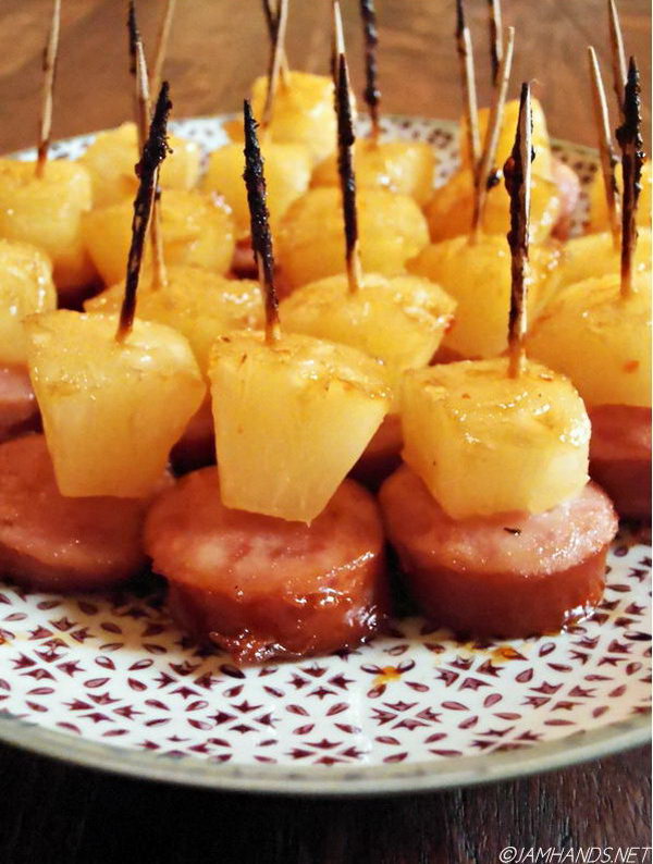 Glazed Pineapple Kielbasa Bites. Top kielbasa slices with pineapple pieces and pierce a toothpick through them. Place kielbasa bits onto the baking sheet and add some ingredients to serve your guests with incredible delicious flavor for a summer party. 