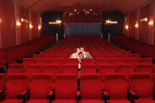 Cozy Theater Wedding. So many people may be confused about how to choose some creative wedding venues. Follow this genuine tip by holding your wedding ceremony at the same place where you had your first date. 