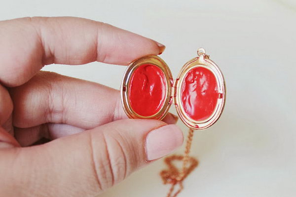 Lip Balm Locket. Slice a piece of lip balm off and put it in your locket. Use the blow dryer to make the lip melt. It serves as a beautiful decor as well as easy make up. The most important is that it's not expensive at all. 