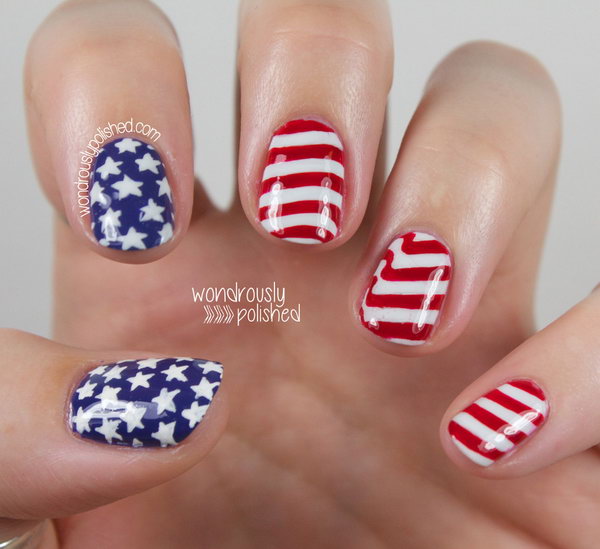 Simple Stars and Stripes 4th of July Nail Art: This manicure is so simple and cute. Stamped white stars onto blue base of two nails, and freehand red stripes on white gradient of the other three nails. The subtle gradient really makes the whole thing pop. See the tutorial here. 
