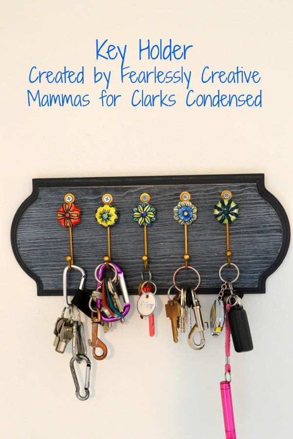 DIY Key Holder with Vintage Look.  Using unusual hooks and mixed paints to change the traditional look of the key holder.  I love the colors of these hooks and they are so unusual and they add more chic and vintage look to your home. See more instructions 