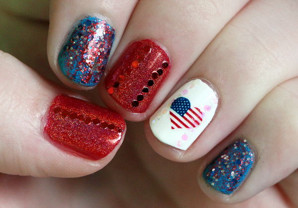 Patriotic Red, White, Blue and Sparkly Nails: This 4th of July sparkly nail design accented with a flag decal to show some love on the Fourth of July is a perfect way to keep your patriotism looking pretty. See the tutorial here. 