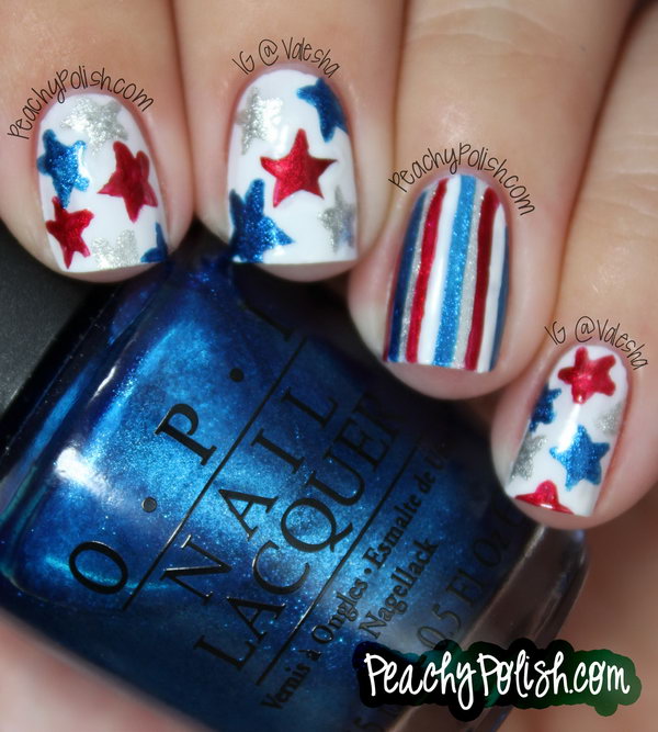 Patriotic Glitter Stars and Stripes Nail Art: Freehand glitter stars and stripes on the white base coats and you're ready to be rocking with this clean and elgant manicure. See the tutorial here. 