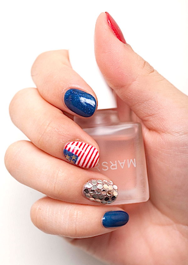 Patriotic American Flag Nails:  Try this glamorous American flag nail art, using red and blue polish with flecks of glitter, gold rhinestones and an American flag with mini stripes and stars. Then get ready to be rocking. See the tutorial 