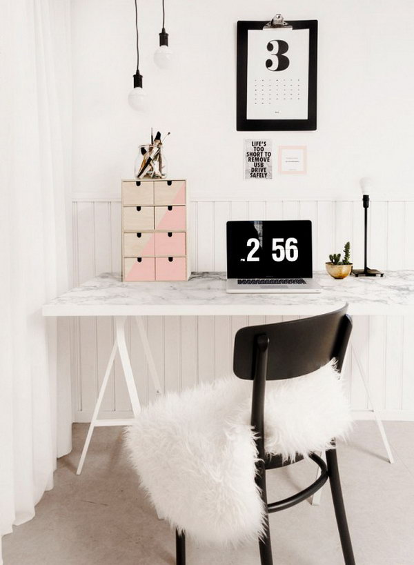 A Faux Marble Desk. Another clever DIY desk. The tabletop with marble printed paper, that is available in hardware stores or online, gives this simple IKEA desk a luxurious look. 