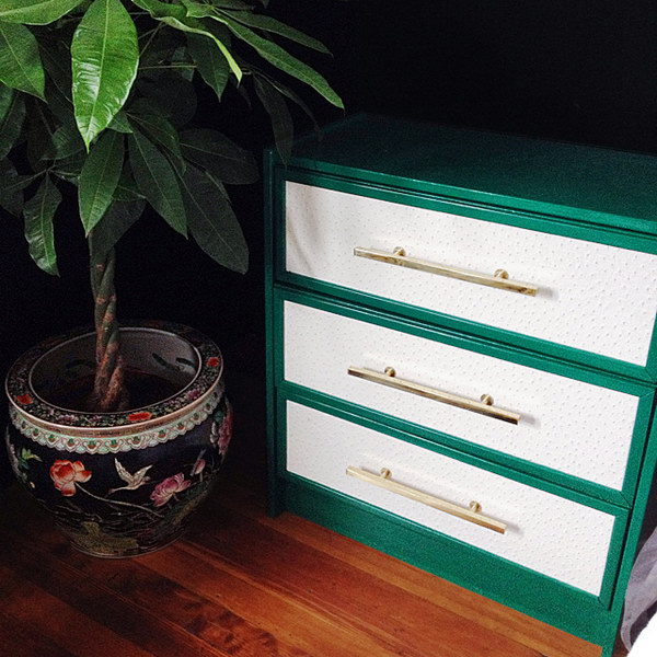 DIY Green & Ostrich Rast Dresser Hack. An emerald green paint job and vinyl ostrich inspired fabric give the base dresser from IKEA a new life. Love this genius hack for the bedroom nightstand. 