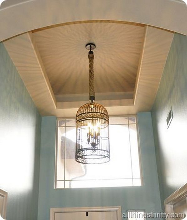 DIY Gorgeous Birdcage Chandelier from a Large Birdcage. 