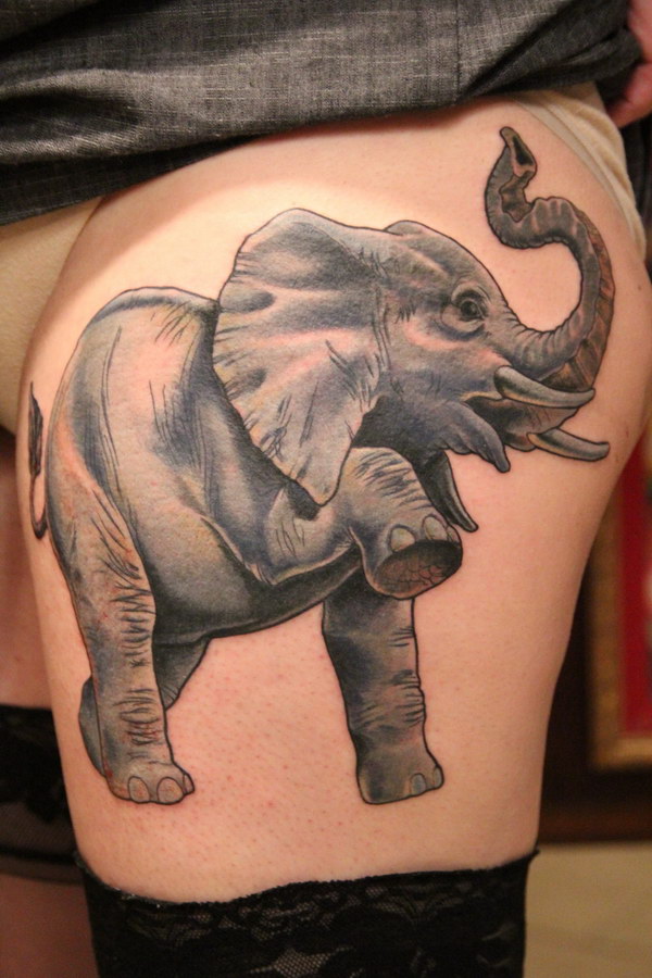 Awesome Elephant Thigh Tattoo for Girl. 