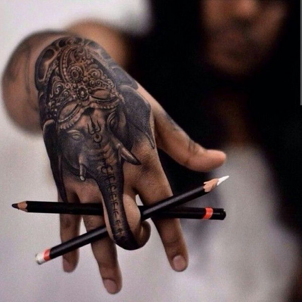 Incredible Elephant Hand Tattoo. 