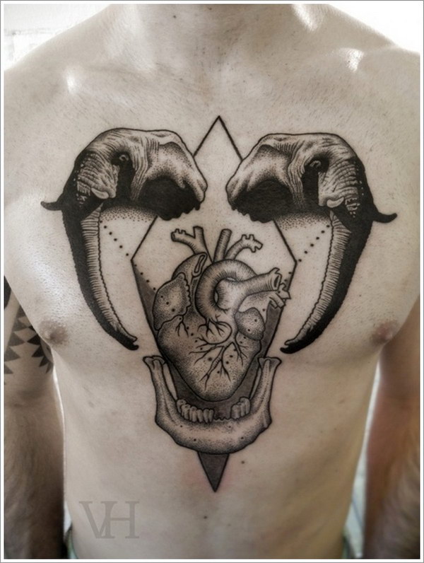 Powerful Elephant Heads Chest Tattoo. 