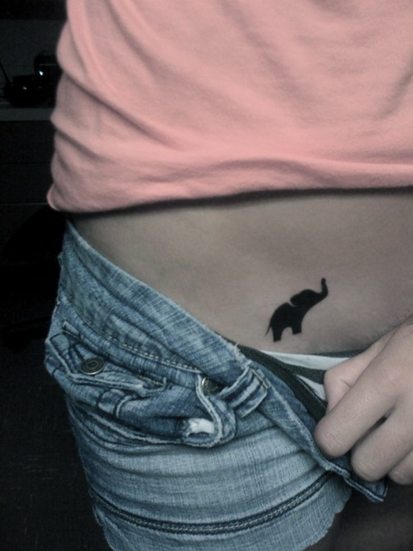 Small Black Elephant Tattoo On Hip. 