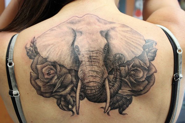 Elephant Tattoo On Neck Back. 