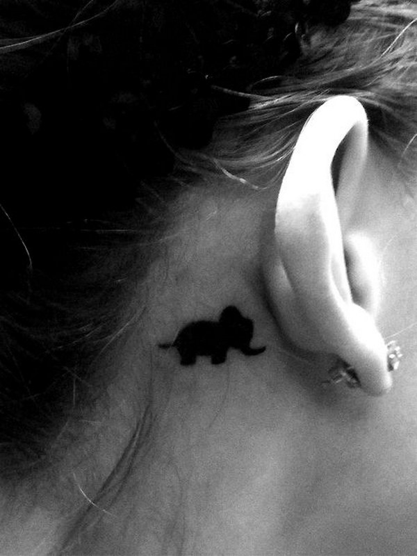 Simple Cute Back of the Ear Elephant Tattoo. 