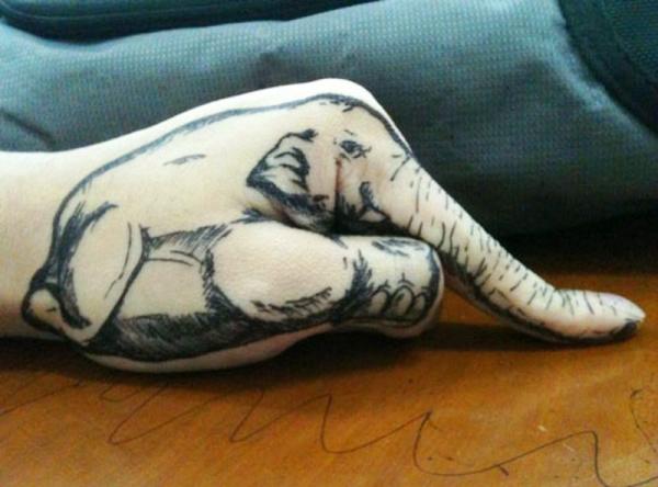 Cute Elephant Hand Tattoo. 