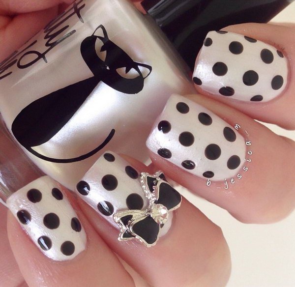 Pearl and Black Polka Dot Nails With Black and Silver Bow 