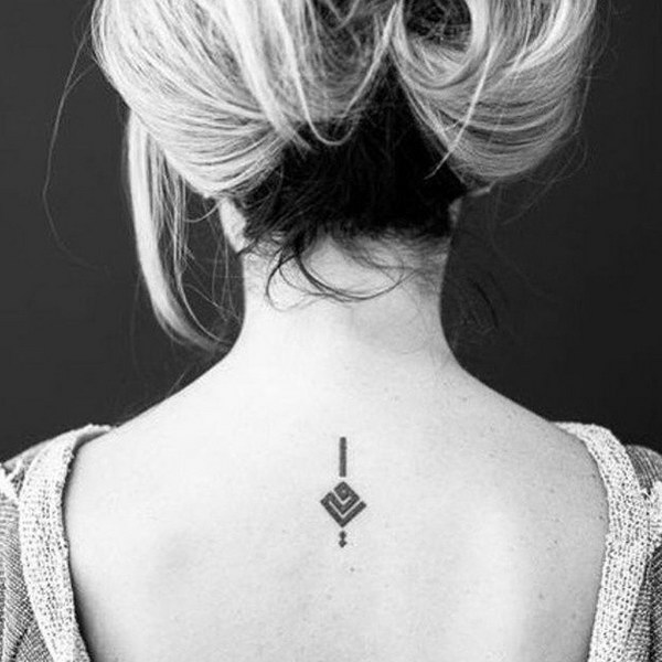 Pretty and Understated Geometric Tattoo on Back of Neck 