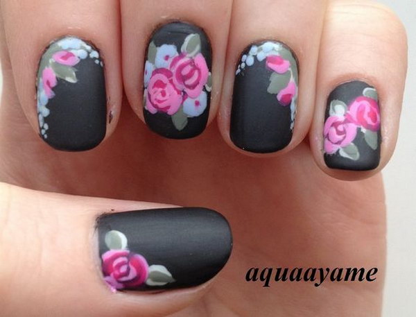 Floral Black Matte Nail Art. 