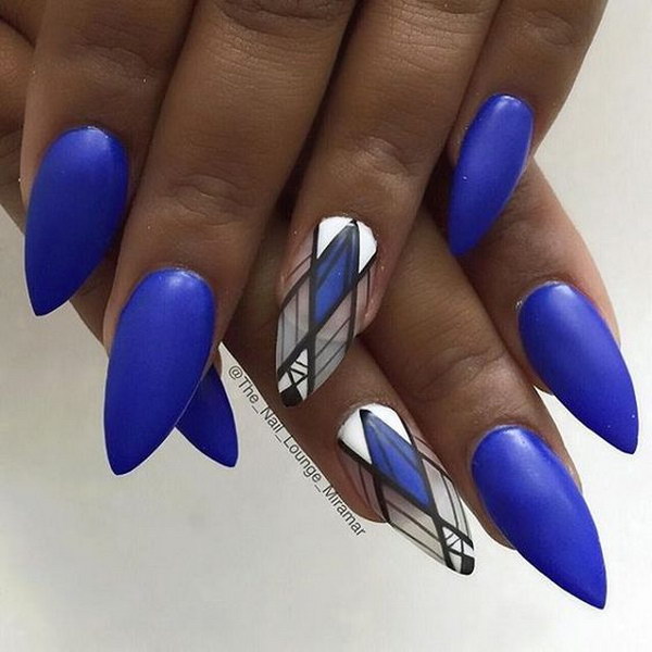 Matte Blue Nail Art Design With Intricate Tribal Themed Details For Effect. 