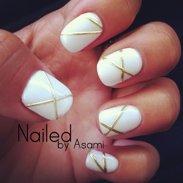 White and Gold Lines Design with Gel Nails. 