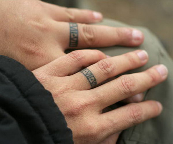 Identical Ring Tattoos. 