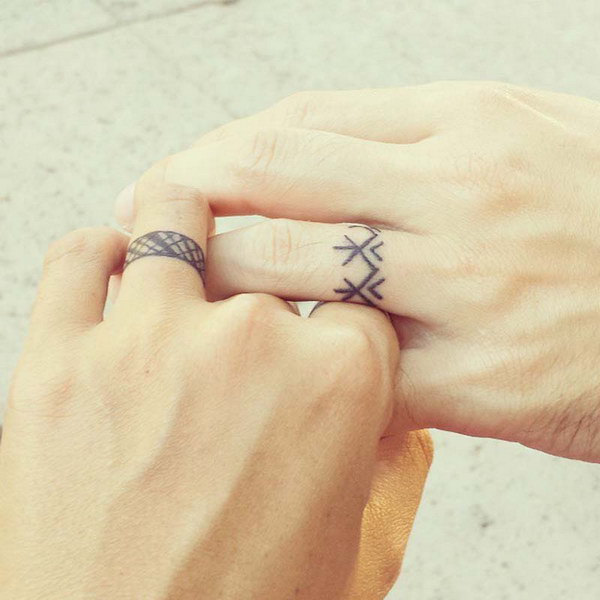 Cool Matching Ring Tattoos For Couples. 