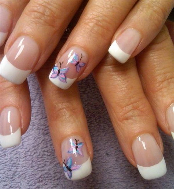 Classic French Tip Nails with Butterflies Accent. 