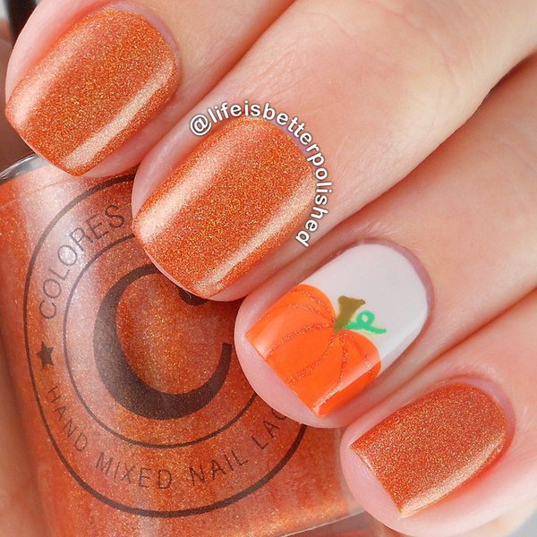Glittery Orange and Pumpkins Fall ready Mani. 