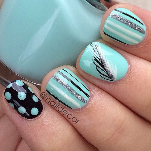 Turquoise, Black Nails with Sliver Glitter, Strips, Polkadots, and a Feather. 
