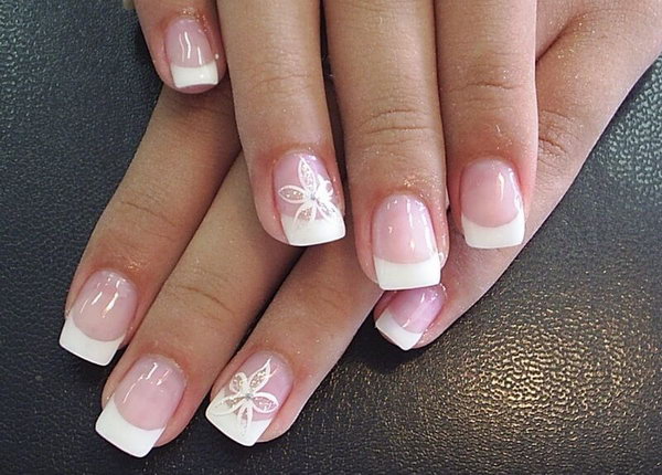 White Tipped French Manicure with Flowers. See the tutorial 