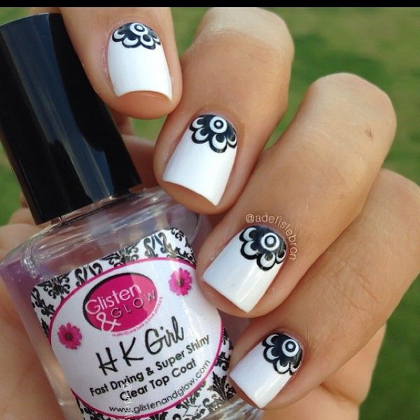 Black and White Floral Half Moon Nails. 