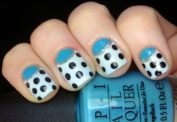 Blue Half Moon Nails Accented with Polka Dots. Get the tutorial 
