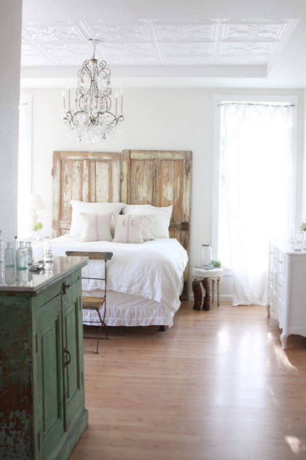 White Shabby Chic Bedroom with Distressed Door Headboard. 
