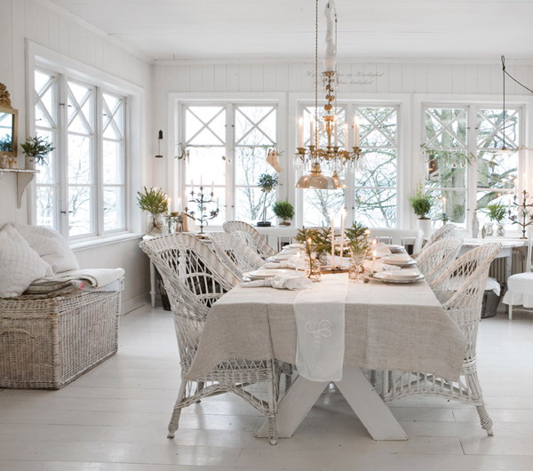 Shabby Chic White Dining Room with Wicker Chair, All White Walls And Flooring. 