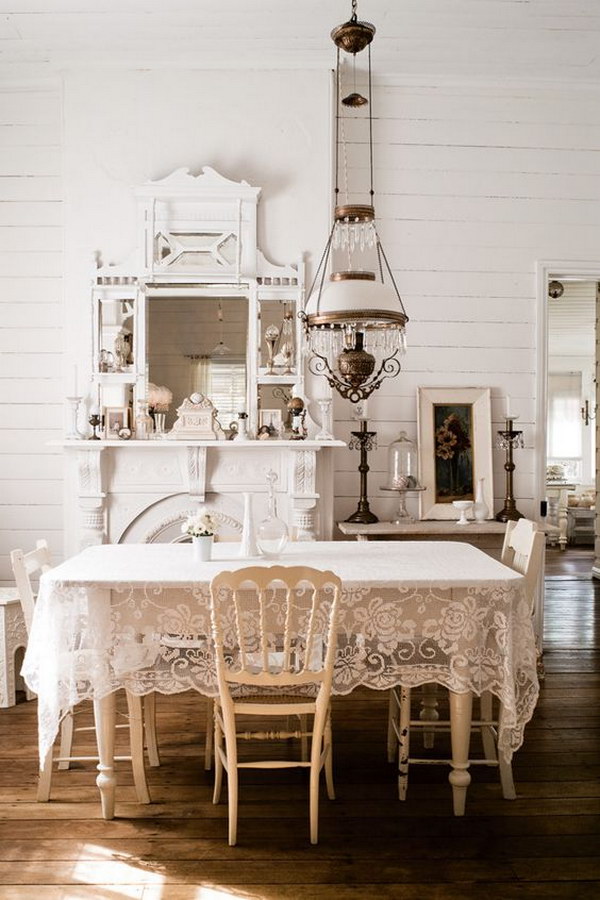 Elegant Shabby Chic Dining Room with Lace Table Cloth and Vintage Crystal Chandelier 