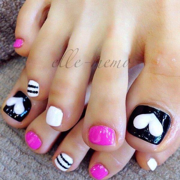 Black and White Toenail Design Accented with Heart and Strips. 